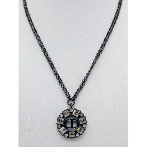 118 - A Christian Dior Limited Edition Grey-Toned Logo and White Stone Necklace and Tribales Earrings Set.... 