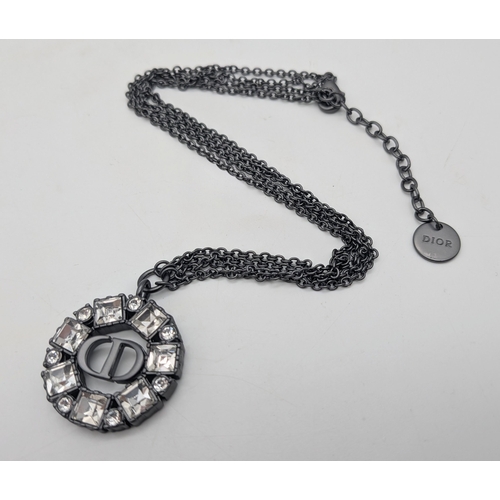 118 - A Christian Dior Limited Edition Grey-Toned Logo and White Stone Necklace and Tribales Earrings Set.... 