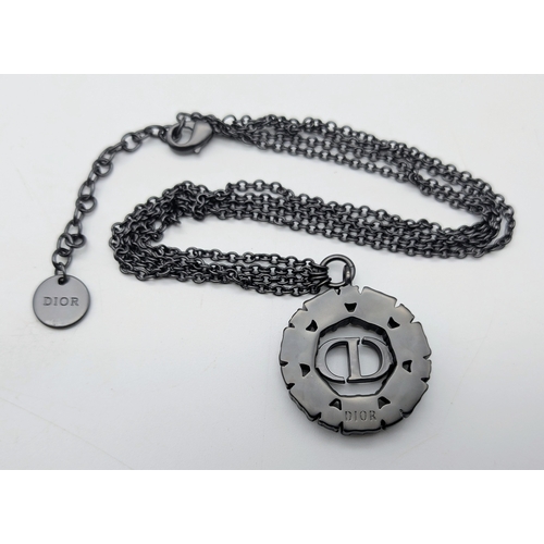 118 - A Christian Dior Limited Edition Grey-Toned Logo and White Stone Necklace and Tribales Earrings Set.... 