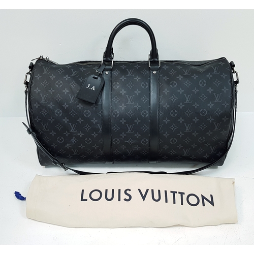 120 - A Louis Vuitton Monogram Eclipse Keepall Bandoulière 55 Travel Bag. Crafted in grey-on-black monogra... 