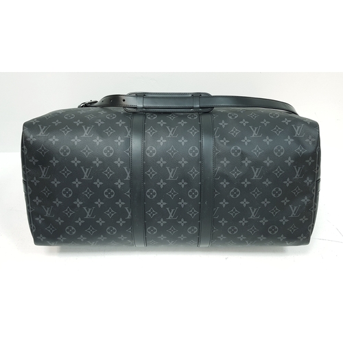 120 - A Louis Vuitton Monogram Eclipse Keepall Bandoulière 55 Travel Bag. Crafted in grey-on-black monogra... 