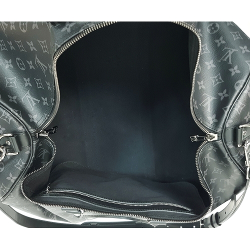 120 - A Louis Vuitton Monogram Eclipse Keepall Bandoulière 55 Travel Bag. Crafted in grey-on-black monogra... 