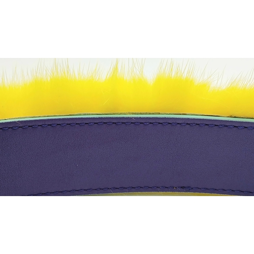 183 - A Fendi Yellow and Purple Shoulder Bag Strap. Fur and leather with silver-toned hardware. Approximat... 