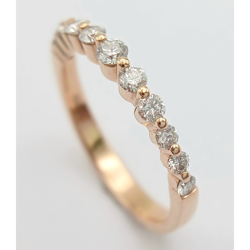 187 - AN 18K ROSE GOLD, DIAMOND SET, HALF ETERNITY RING. 0.41 CTW. 2.6G, SIZE N. SPSA 1019