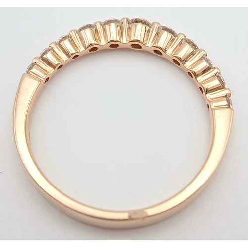 187 - AN 18K ROSE GOLD, DIAMOND SET, HALF ETERNITY RING. 0.41 CTW. 2.6G, SIZE N. SPSA 1019