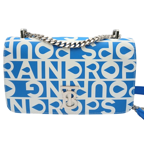190 - A Burberry Blue Lola Raindrop Pouring Shoulder Bag. Leather exterior with silver-toned hardware, cha... 