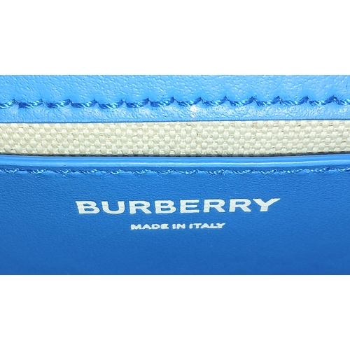 190 - A Burberry Blue Lola Raindrop Pouring Shoulder Bag. Leather exterior with silver-toned hardware, cha... 