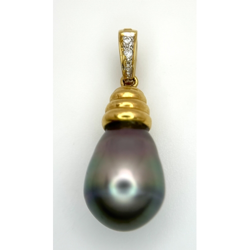 191 - An 18K Yellow Gold and Diamond Pendant with Tahitian Pearl. 2.5cm. 4.25g total weight.
