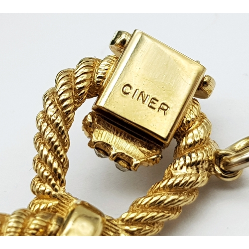 195 - A Vintage 1950s Ciner 18K Gold Plated White Stone Set Bracelet. Complete with safety chain. 19cm len... 