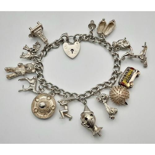 196 - Vintage SILVER CHARM BRACELET, Having some Exceptional Silver Charms to include , Hedgehog , Teddy B... 