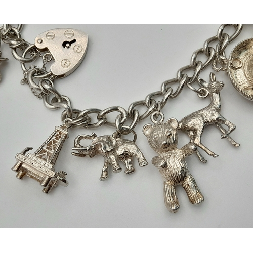 196 - Vintage SILVER CHARM BRACELET, Having some Exceptional Silver Charms to include , Hedgehog , Teddy B... 