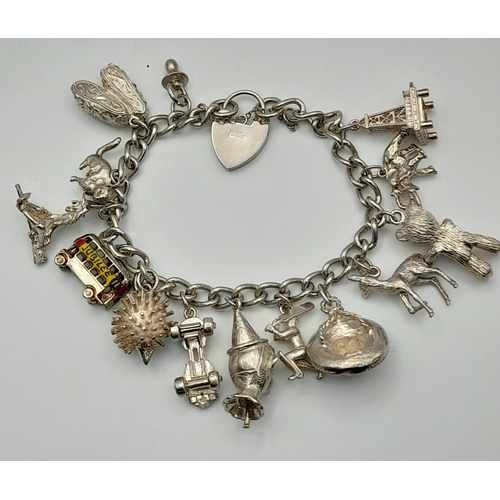 196 - Vintage SILVER CHARM BRACELET, Having some Exceptional Silver Charms to include , Hedgehog , Teddy B... 