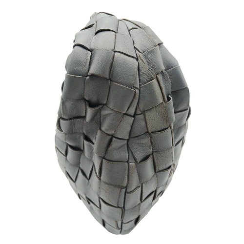 197 - A Bottega Veneta Intrecciato Mini Jodie Handbag. Woven grey/blue leather exterior with gold-toned ha... 