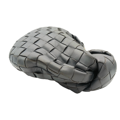 197 - A Bottega Veneta Intrecciato Mini Jodie Handbag. Woven grey/blue leather exterior with gold-toned ha... 