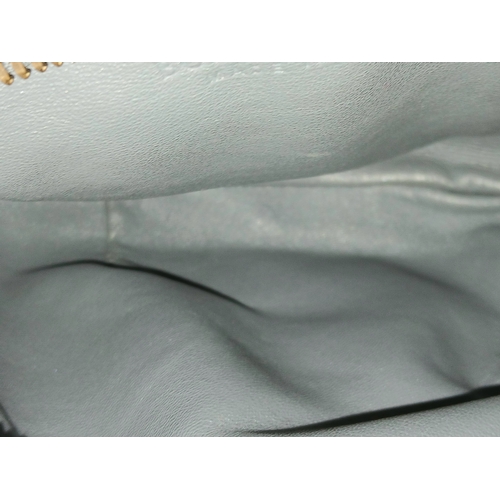 197 - A Bottega Veneta Intrecciato Mini Jodie Handbag. Woven grey/blue leather exterior with gold-toned ha... 