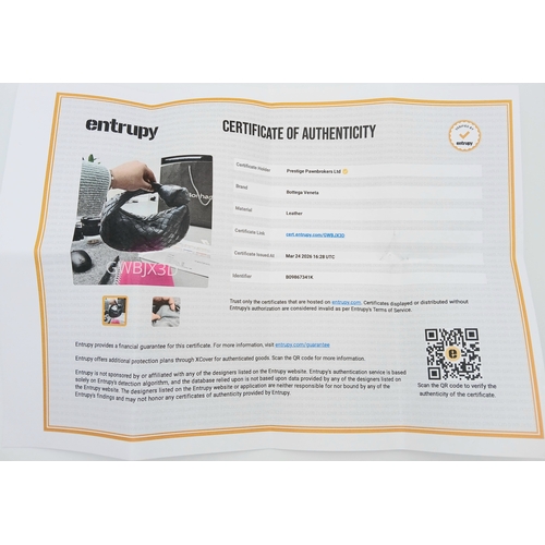 197 - A Bottega Veneta Intrecciato Mini Jodie Handbag. Woven grey/blue leather exterior with gold-toned ha... 