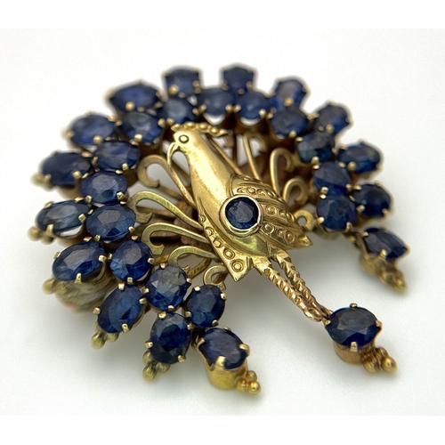 198 - A 14K Yellow Gold Sapphire Peacock Brooch. White metal backing. One stone missing. 30mm x 34mm. 5.19... 