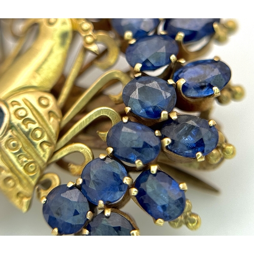 198 - A 14K Yellow Gold Sapphire Peacock Brooch. White metal backing. One stone missing. 30mm x 34mm. 5.19... 
