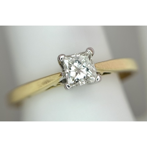 202 - An 18K Yellow Gold Diamond Solitaire Ring. A 0.33ct Princess cut diamond having H colour and SI1 cla... 