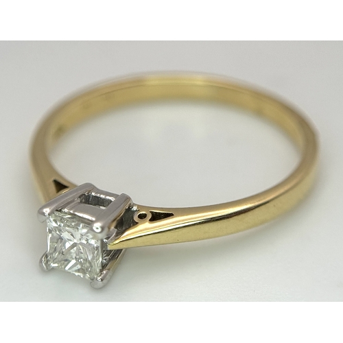 202 - An 18K Yellow Gold Diamond Solitaire Ring. A 0.33ct Princess cut diamond having H colour and SI1 cla... 