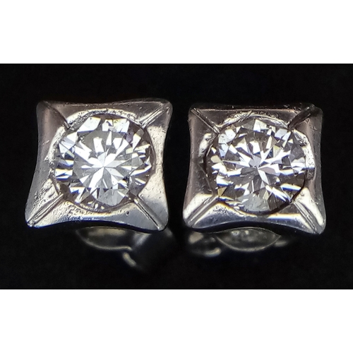 208 - A PAIR OF 14K WHITE GOLD, DIAMOND SOLITAIRE, STUD EARRINGS. 0.50 CTW. 2.8G. MS RED 1009