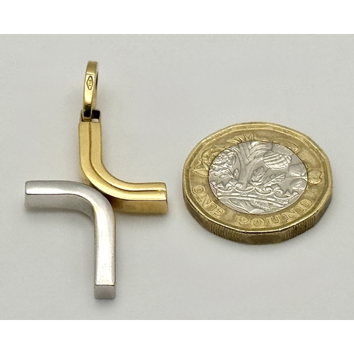 209 - An 18K Yellow and White Gold Abstract Cross Pendant. 4.5cm. 3.9g. MT72.