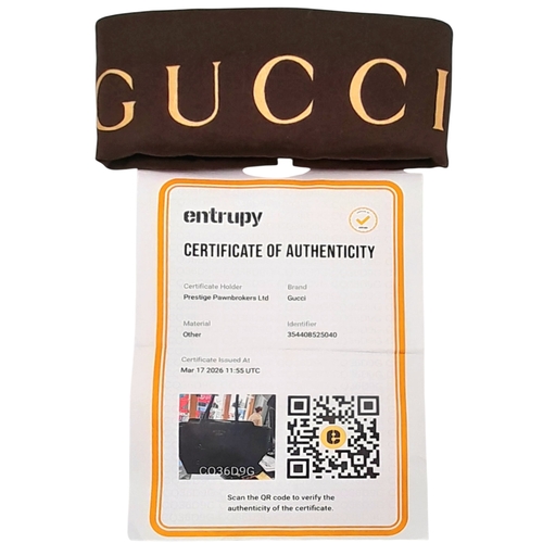 211 - A Gucci Swing Tote Bag. Black grained leather exterior with dual shoulder straps, detachable leather... 