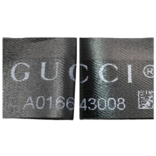 211 - A Gucci Swing Tote Bag. Black grained leather exterior with dual shoulder straps, detachable leather... 