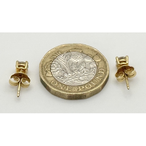 212 - A Pair of 18K Yellow Gold Diamond Stud Earrings. 0.70ctw of round brilliant cuts having near white c... 