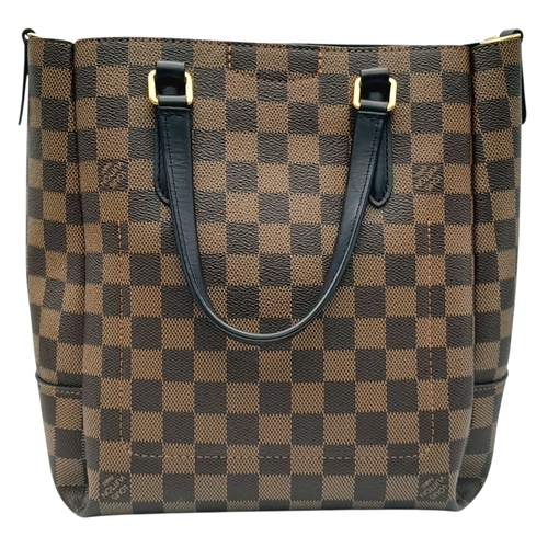 218 - A Louis Vuitton Damier Ebene Belmont Tote Bag. Brown Damier Ebene coated canvas exterior with black ... 