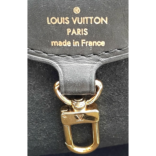 218 - A Louis Vuitton Damier Ebene Belmont Tote Bag. Brown Damier Ebene coated canvas exterior with black ... 