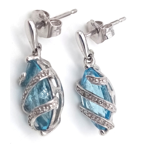 222 - A PAIR OF 9K WHITE GOLD, BLUE TOPAZ AND DIAMOND SET, DROP EARRINGS. 3G. MS RED 1005
