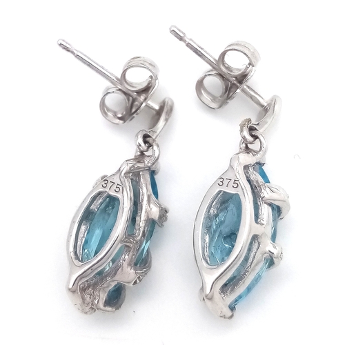 222 - A PAIR OF 9K WHITE GOLD, BLUE TOPAZ AND DIAMOND SET, DROP EARRINGS. 3G. MS RED 1005