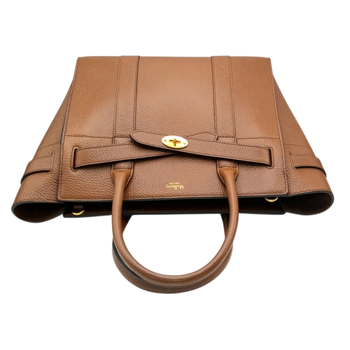 225 - A Mulberry Bayswater Handbag. Oak brown grain leather exterior with gold-toned hardware, dual top ha... 