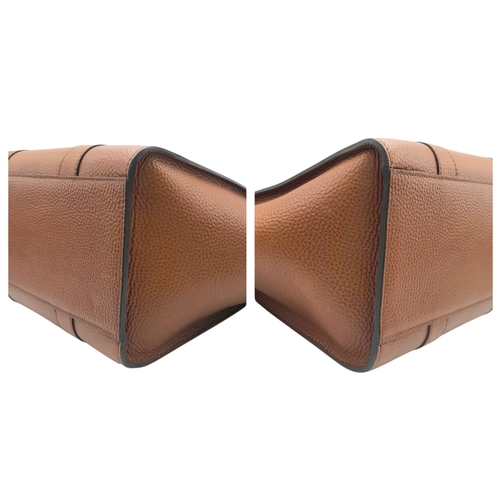225 - A Mulberry Bayswater Handbag. Oak brown grain leather exterior with gold-toned hardware, dual top ha... 