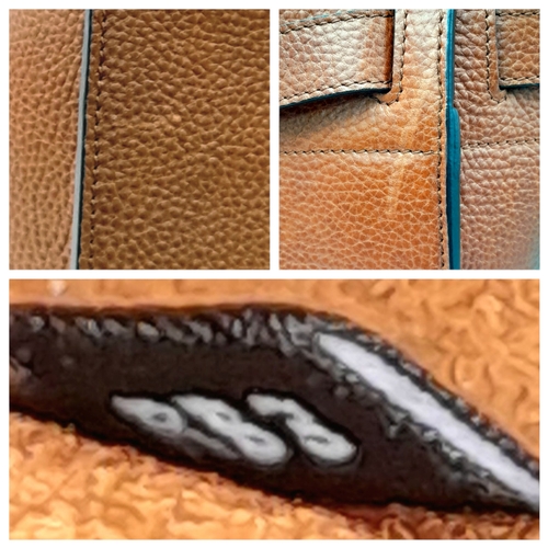 225 - A Mulberry Bayswater Handbag. Oak brown grain leather exterior with gold-toned hardware, dual top ha... 