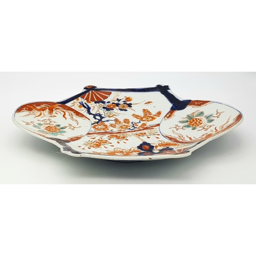 302 - An Antique Japanese Meiji Period Imari Fan-Shaped Porcelain Plate. Decorated with hand-painted panel... 
