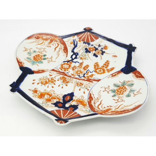 302 - An Antique Japanese Meiji Period Imari Fan-Shaped Porcelain Plate. Decorated with hand-painted panel... 