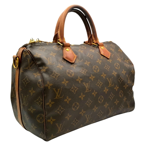 303 - A Louis Vuitton Monogram Speedy 30 Handbag. Signature brown monogram coated canvas exterior with vac... 