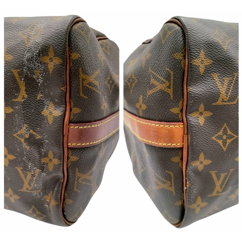 303 - A Louis Vuitton Monogram Speedy 30 Handbag. Signature brown monogram coated canvas exterior with vac... 