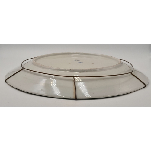 309 - An Antique Chinese Porcelain Decorative Charger. Famille rose design with a floral cart scene. Marki... 