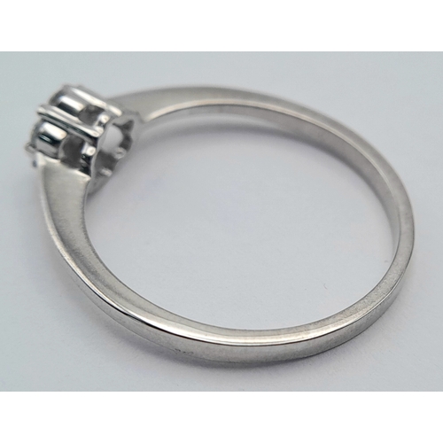 313 - A 9K WHITE GOLD, DIAMOND CLUSTER RING. 0.25 CTW, 1.8G, SIZE Q. SC 7007