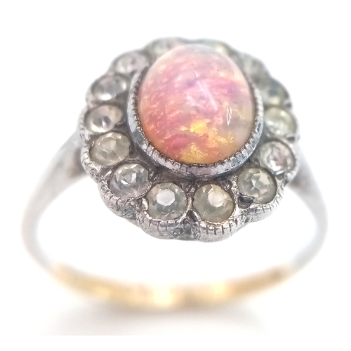 315 - Dainty 9 CARAT GOLD and SILVER RING with lab OPAL CABOCHON to Centre. Size J - J 1/2.