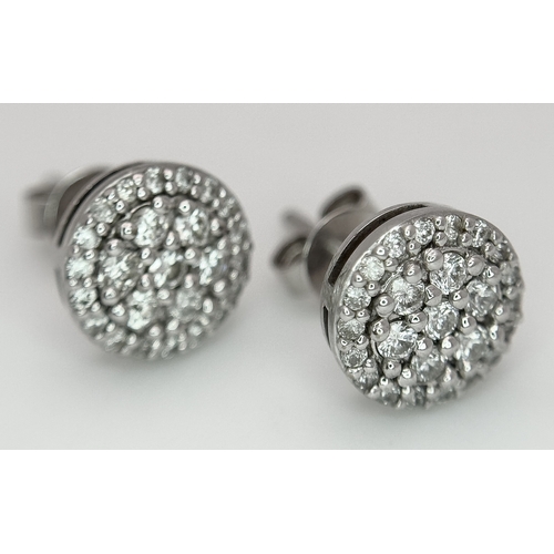 316 - An 18K White Gold Diamond Cocktail Ring and a Pair of Diamond Cluster Stud Earrings. Ring, size P 1/... 