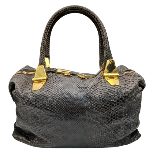 317 - A Tom Ford Python Skin Leather Handbag. Crafted in dark brown genuine python skin with a rich, natur... 