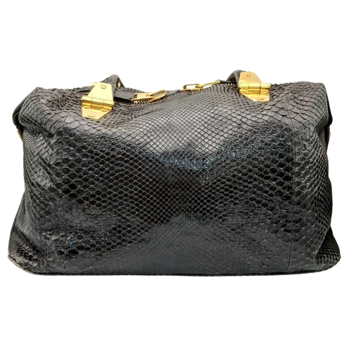 317 - A Tom Ford Python Skin Leather Handbag. Crafted in dark brown genuine python skin with a rich, natur... 