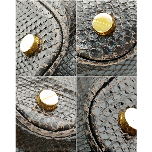 317 - A Tom Ford Python Skin Leather Handbag. Crafted in dark brown genuine python skin with a rich, natur... 