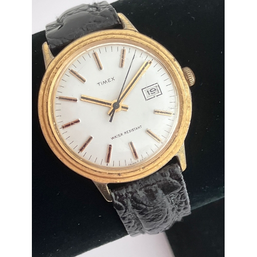 322 - Gentleman’s Vintage 1960/70’s TIMEX WRISTWATCH. Gold Plated Finish. Black Leather Strap. Manual wind... 