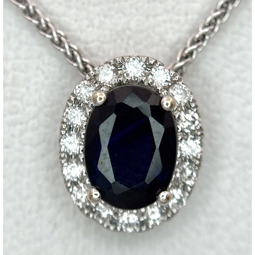 330 - An 18K White Gold, Sapphire and Diamond Oval Shaped Pendant on an 18K White Gold Chain necklace. 0.7... 