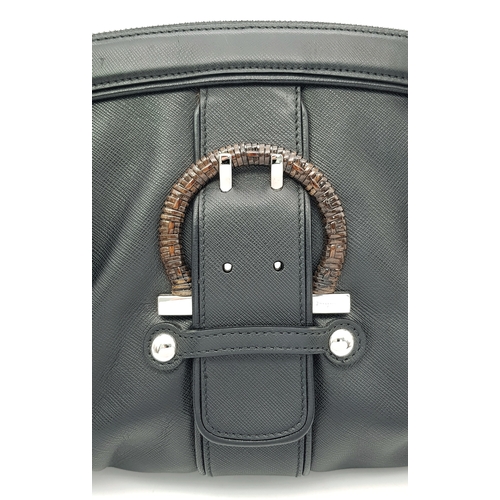331 - A Salvatore Ferragamo Black Leather Handbag. Crafted in structured black leather with silver-tone ha... 